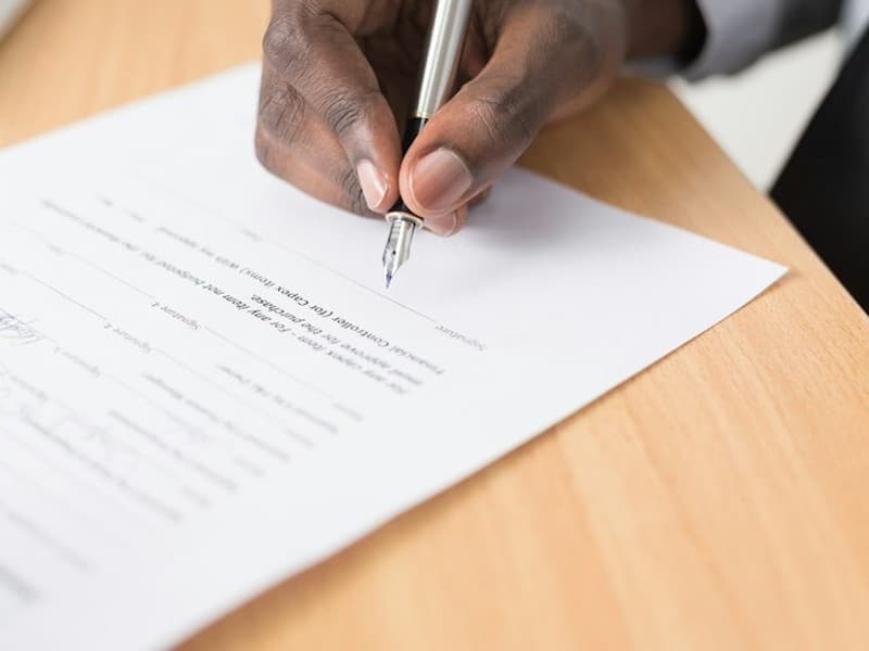 Insurance policy being signed