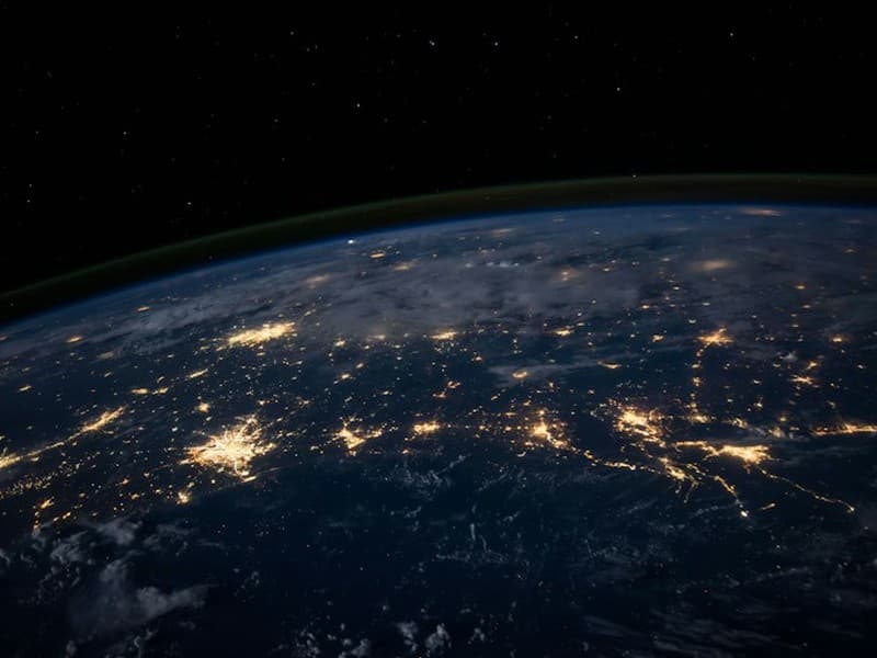 Earth at night showing connected city lights