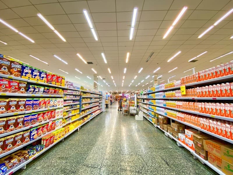 Supermarket aisle stocked with consumer goods